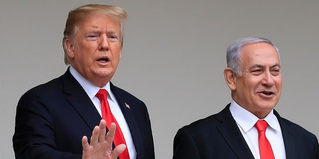 Then President Trump welcomes visiting Israeli Prime Minister Benjamin Netanyahu to the White House in Washington, Monday, March 25, 2019.