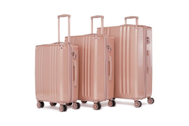 CALPAK Ambeur 3-Piece Luggage Set in rose gold against white background.