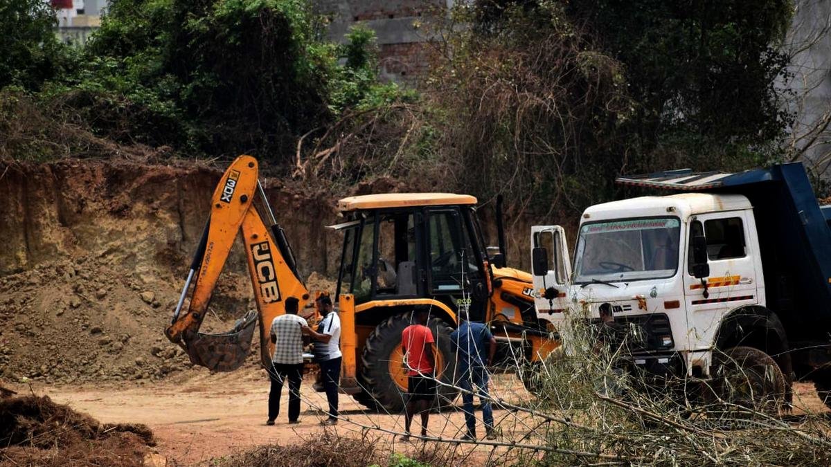 The heavy machinery used by the land mafia to illegally flatten areas around Sisupalgarh.