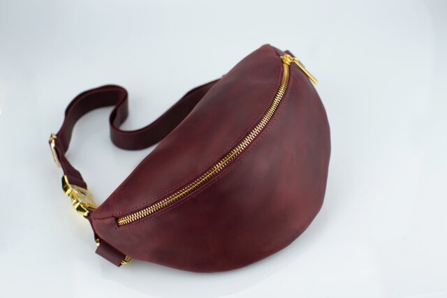 Genius Leather Shop Leather Fanny Pack in dark brown against neutral background